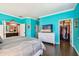 Bright main bedroom with ensuite bathroom, walk-in closet, and wood-look floors, providing comfort and convenience at 21627 Pearl Crescent Ct, Land O Lakes, FL 34637