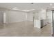 Open-concept living area with tile flooring and a view into other rooms of the house at 2731 Winding Creek Trl, North Port, FL 34289