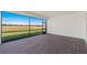 Lanai features stunning brick pavers with an inviting view of the pond and verdant landscape at 2731 Winding Creek Trl, North Port, FL 34289