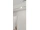 Clean white wall with a door frame at 2731 Winding Creek Trl, North Port, FL 34289