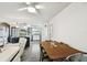 Dining room overlooking kitchen, breakfast bar and stainless appliances at 3202 W Coachman Ave, Tampa, FL 33611