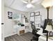 Office space with natural light, ample storage, and a modern workstation setup at 3202 W Coachman Ave, Tampa, FL 33611