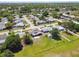 Aerial view of the neighborhood, with tree lined streets at 3257 Masonville Loop, Holiday, FL 34691