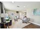 Inviting living room featuring hardwood floors, recessed lighting, and neutral paint colors at 3257 Masonville Loop, Holiday, FL 34691