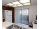 Bright kitchen featuring a window, refrigerator, and ample natural light at 337 Woodlake Wynde, Oldsmar, FL 34677
