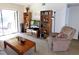 Comfortable living area with sliding glass doors to the patio offering natural light at 337 Woodlake Wynde, Oldsmar, FL 34677