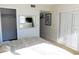 Comfortable bedroom featuring a large window, soft lighting and neutral tones at 337 Woodlake Wynde, Oldsmar, FL 34677
