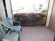 Cozy outdoor patio area with seating and views of the surrounding community at 337 Woodlake Wynde, Oldsmar, FL 34677