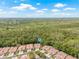 The property features a large area with mature trees and well-maintained landscaping at 3810 Darston St, Palm Harbor, FL 34685