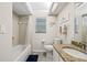 Bathroom with a granite countertop vanity, tile floor, and a shower-tub combination at 3810 Darston St, Palm Harbor, FL 34685