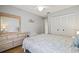 Bedroom with hardwood floors and a large closet, creating a cozy retreat at 3810 Darston St, Palm Harbor, FL 34685