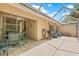 Outdoor patio with screened in porch, seating, and barbecue at 3810 Darston St, Palm Harbor, FL 34685