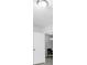 An open doorway reveals a view of the dining area, creating an inviting transition between spaces at 4508 26Th S Ave, Tampa, FL 33619