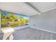 Enclosed porch with tile flooring offering beautiful water views, ideal for relaxing or entertaining guests at 4508 26Th S Ave, Tampa, FL 33619