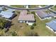 Aerial view of the home and surrounding neighborhood, with well-maintained lawns and landscaping at 4534 Great Lakes S Dr, Clearwater, FL 33762