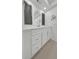 Bathroom featuring updated cabinets and granite countertops at 4534 Great Lakes S Dr, Clearwater, FL 33762