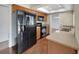 Well-equipped kitchen featuring stainless steel appliances and wood cabinets offering ample storage at 4534 Great Lakes S Dr, Clearwater, FL 33762