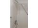 Shower area equipped with shower head, grab bar, and matching fixtures at 4534 Great Lakes S Dr, Clearwater, FL 33762