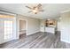 Bright living space with wood flooring and contemporary finishes at 5000 Culbreath Key Way # 9-104, Tampa, FL 33611