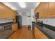 Spacious kitchen with stainless steel appliances, plenty of cabinet space, and stylish backsplash at 5634 Tanagergrove Way, Lithia, FL 33547