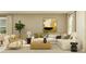 Cozy living room is furnished with a plush sofa, armchairs and decor that create a relaxing and inviting atmosphere at 5656 Red Kite Dr, Wimauma, FL 33598
