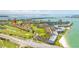 Aerial view of community featuring golf course, waterfront views, and lush landscaping at 6131 Bahia Del Mar Blvd # 240, St Petersburg, FL 33715