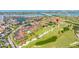 Stunning aerial view of a lakeside community with lush green lawns and access to waterfront activities at 6131 Bahia Del Mar Blvd # 240, St Petersburg, FL 33715