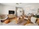 Comfortable living room with stylish furnishings, wood-look flooring, and an open concept design at 6131 Bahia Del Mar Blvd # 240, St Petersburg, FL 33715
