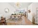 Bright living space with open layout, showcasing the dining area and views of the beautiful golf course at 6131 Bahia Del Mar Blvd # 240, St Petersburg, FL 33715