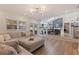 Inviting living room boasts hardwood floors and a seamless transition to the dining area at 7120 3Rd N Ave, St Petersburg, FL 33710