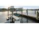 Close-up of a private boat lift offering easy access to the waterfront at 744 Spanish Main Dr, Apollo Beach, FL 33572