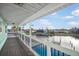 Inviting deck with views of the neighborhood waterfront, and pool providing a relaxing outdoor retreat at 744 Spanish Main Dr, Apollo Beach, FL 33572