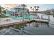 Beautiful waterfront home with a private dock, pool, and outdoor entertaining area at 744 Spanish Main Dr, Apollo Beach, FL 33572