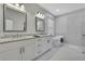Bright bathroom featuring double sinks, a modern soaking tub, and a separate shower at 7740 Blue Spring Dr, Land O Lakes, FL 34637