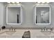 Well-lit bathroom vanity with dual sinks and LED mirrors offers contemporary style at 7740 Blue Spring Dr, Land O Lakes, FL 34637