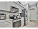 Well-equipped kitchen featuring stainless steel appliances and bright countertop spaces at 7740 Blue Spring Dr, Land O Lakes, FL 34637