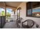 Cozy condo balcony with chairs, perfect for enjoying the outdoors at 9910 Eagles Point Cir # 3, Port Richey, FL 34668