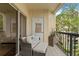 Balcony showing outdoor seating, lush green trees and decorative wall hanging at 1002 S Harbour Island Blvd # 1312, Tampa, FL 33602