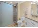 Bathroom featuring tiled walk-in shower and granite vanity top at 1002 S Harbour Island Blvd # 1312, Tampa, FL 33602