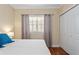 Bedroom showcasing wood floors, large window, and closet at 1002 S Harbour Island Blvd # 1312, Tampa, FL 33602