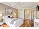 Bedroom with ceiling fan and an attached bathroom through an open door at 1002 S Harbour Island Blvd # 1312, Tampa, FL 33602