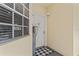 Inviting front door with decorative details, adjacent window, and a welcoming entryway mat at 1002 S Harbour Island Blvd # 1312, Tampa, FL 33602