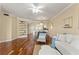 Spacious living room with hardwood floors, dining area, and open kitchen at 1002 S Harbour Island Blvd # 1312, Tampa, FL 33602