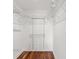Walk-in closet offering generous storage space with built-in shelving and hardwood floors at 1002 S Harbour Island Blvd # 1312, Tampa, FL 33602
