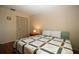 Comfortable bedroom featuring a large closet and warm, inviting decor at 1012 Warwick Ct, Sun City Center, FL 33573