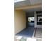 Carport offers covered parking and convenient access to the home at 1012 Warwick Ct, Sun City Center, FL 33573