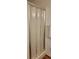 This bathroom shower features a sliding door and tiled floors at 1012 Warwick Ct, Sun City Center, FL 33573