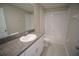 Bathroom features a large vanity, mirror, and tiled shower/tub at 1038 Ocean Spray Dr, Ruskin, FL 33570