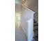 Bright, modern staircase leading to the upper level of the home at 1038 Ocean Spray Dr, Ruskin, FL 33570