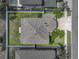 Aerial view of home featuring a well-maintained yard and mature landscaping at 11308 Callaway Pond Dr, Riverview, FL 33579
